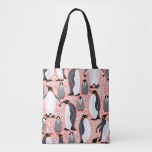 Emperor penguins and their cubs on a pink patterne tote bag