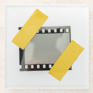 Empty 35mm film frame, yellow strips. glass coaster