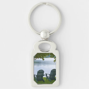 Empty Adirondack Chairs facing a Lake Key Ring