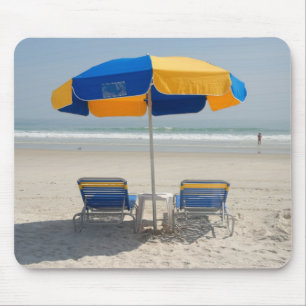 empty beach chairs mouse mat