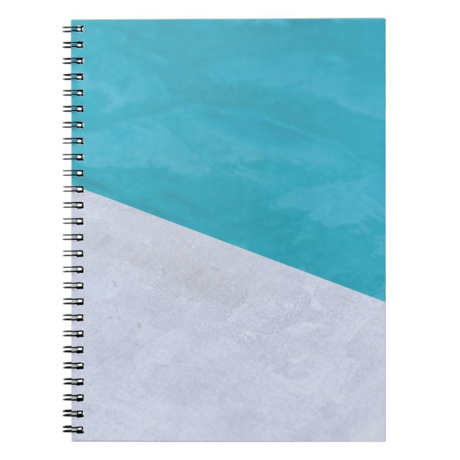 Empty grey floor beside pool notebook (Front)