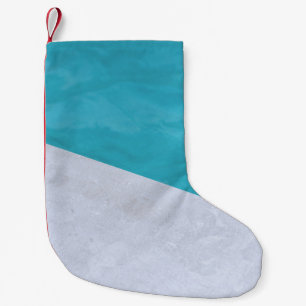 Empty grey floor beside pool small christmas stocking