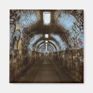 Empty Train Tunnel with Graffiti Magnet
