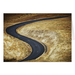 Empty winding paved road