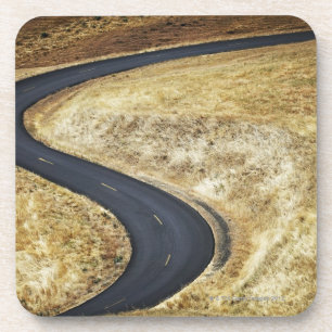 Empty winding paved road coaster