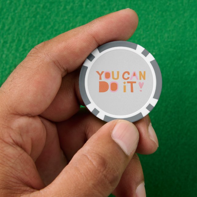 Encouragement text on grey poker chips (Hand)