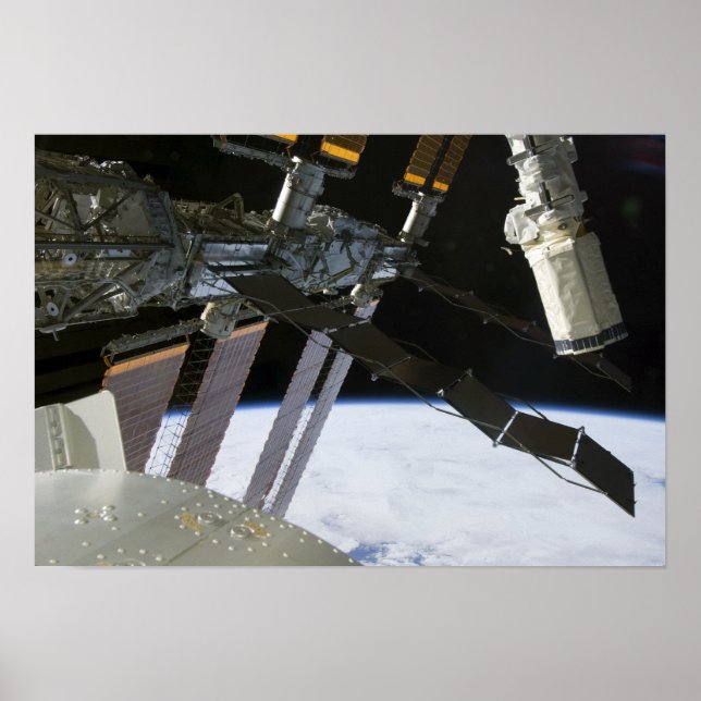 Endeavor's arm amidst International Space Stat Poster (Front)