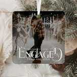 Engaged Minimalist Fun Typography Photo Metal Tree Decoration<br><div class="desc">Celebrate your first holiday as an engaged couple with the Engaged Minimalist Fun Typography Photo Metal Ornament. This ornament combines clean, simple design with handwritten script and a stylish vintage Christmas aesthetic, perfect for adding a touch of elegance to your tree. Crafted from shatterproof metal, it’s both lightweight and durable,...</div>