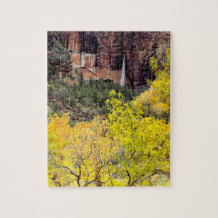 Ephemeral waterfall pours out of slot in cliff jigsaw puzzle