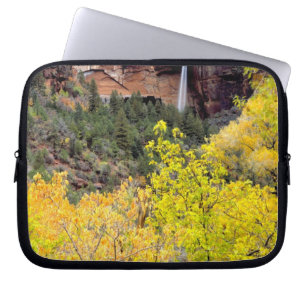 Ephemeral waterfall pours out of slot in cliff laptop sleeve