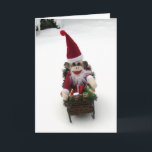 Ernie the Sock Monkey Santa Christmas Card<br><div class="desc">Ernie the Sock Monkey looks so very much like Santa...  could this really BE Santa with his sleigh and toys? Hmmmmm... .. Please visit Ernie the Sock Monkey at  www.ErnieTheSockMonkey.com www.facebook.com/ErnieTheSockMonkeysAdventures www.zazzle.com/ErnieTheSockMonkey*</div>