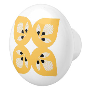 Ethnic flower ornate yellow and black ceramic knob