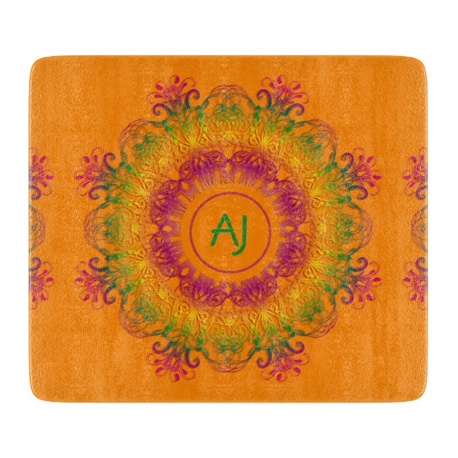 Ethnic Mandala Monogram.Orange background. Cutting Board (Front)