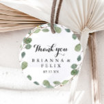 Eucalyptus Calligraphy Thank You Wedding Favour Classic Round Sticker<br><div class="desc">This eucalyptus calligraphy thank you wedding favour classic round sticker is perfect for a rustic wedding. The design features hand-drawn botanical green eucalyptus branches and leaves. Make the sticker labels your own by including your names, the event (if applicable), and the date. These stickers can compliment a wedding reception, bridal...</div>