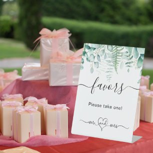 Eucalyptus greenery ferns wedding favours guests  pedestal sign