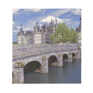Europe, France, Chambord. A stone bridge leads Notepad