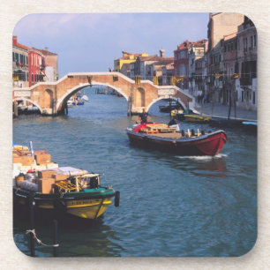 Europe, Italy, Venice. Boats bringing in Coaster