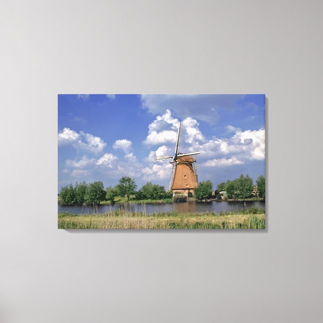 Europe, Netherlands, Kinerdijk. A windmill sits Canvas Print (Front)