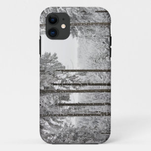Evergreen forest in winter iPhone 11 case