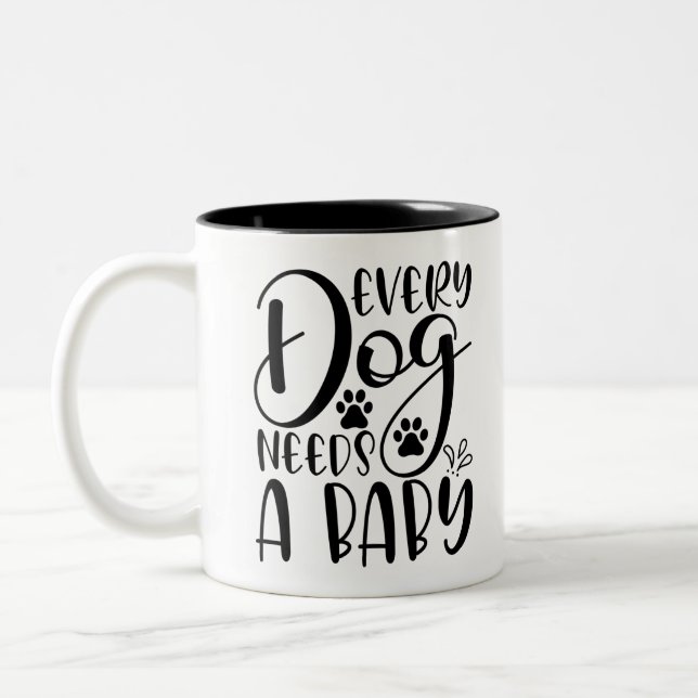 Every Dog Needs A Baby Pregnancy Announcement Two-Tone Coffee Mug (Left)