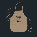 Everything Tastes Better At Nana's Kids Apron<br><div class="desc">Black modern typography design with brush script and design ornaments and flourishes. Words read,  "Everything tastes BETTER at Nana's."  Perfect grandchild or grandparent gift!</div>