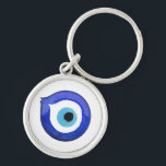Evil Eye Key Ring<br><div class="desc">This eye-catching keychain features an intricate Evil Eye design,  symbolising protection against negative energy and bringing good luck..</div>