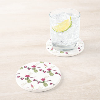 Exotic flower arrangement in glass coaster