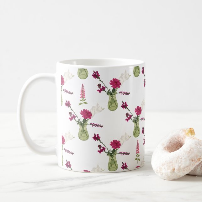 Exotic flower arrangement in glass coffee mug (With Donut)