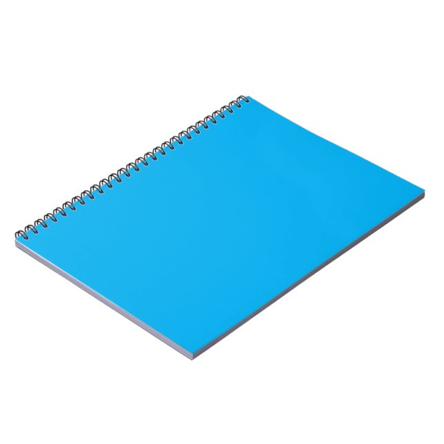 Experience the Beauty of a Blue Sky with a Plane Notebook (Left Side)