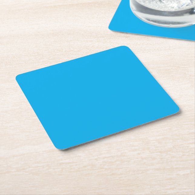 Experience the Beauty of a Blue Sky with a Plane Square Paper Coaster (Angled)