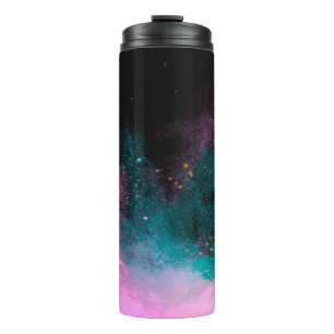 Explosion of colored powder isolated on black back thermal tumbler