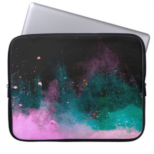 Explosion of coloured powder isolated on black bac laptop sleeve