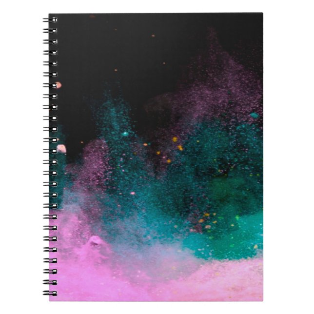 Explosion of coloured powder isolated on black bac notebook (Front)
