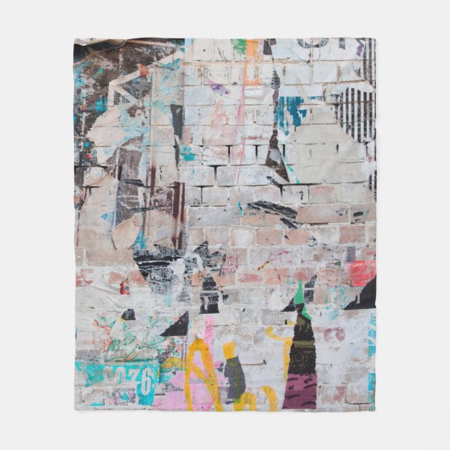 Exposed weathered brick wall with torn street post fleece blanket (Front)