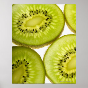Extreme close-up of four pieces of sliced kiwi poster
