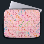 Eyeglasses Retro Modern Hipster Pink Gingham Name Laptop Sleeve<br><div class="desc">This colorful, nerdy eyeglass novelty design laptop sleeve has an original pattern made up of spectacles in a variety of shades and styles, all on a background of retro pink gingham. The cool, girly glasses' frames range from 50s and 60s cat eye / horn rimmed and browline shapes to round,...</div>