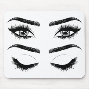Eyes with long eyelashes and brows mouse mat