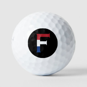 F Monogram overlaid on NLD Flag on bk be6 gbcnt Golf Balls