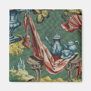 Fabric depicting a chocolate pot and a teapot magnet