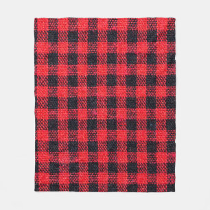 Fabric texture with grid pattern, red squares and  fleece blanket