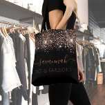 Fabulous birthday black rose gold glitter monogram tote bag<br><div class="desc">For a trendy and glamourous 50th (or any age) birthday. A chic black background decorated with rose gold glitter drops. With the text: 50 and fabulous. Personalise and add a name. Rose gold coloured text. The name is written with a modern hand lettered style script with swashes. To keep the...</div>