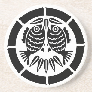 Facing sea breams in bamboo circle coaster