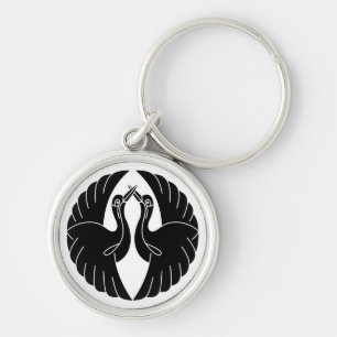 Facing white cranes keychain