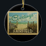 Fairfield Beach Vintage Travel Ceramic Tree Decoration<br><div class="desc">This Greetings From Fairfield vintage postcard design features a sandy beach with a beautiful turquoise ocean water and above the sea,  a blue sky with billowy white clouds. In vintage travels style.</div>