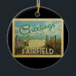 Fairfield Beach Vintage Travel Ceramic Tree Decoration<br><div class="desc">This Greetings From Fairfield vintage postcard design features a sandy beach with a beautiful turquoise ocean water and above the sea,  a blue sky with billowy white clouds. In vintage travels style.</div>