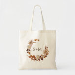 Fall Bride Groom Monogram Leaves Wreath Wedding Tote Bag<br><div class="desc">This elegant fall wedding tote bag features hand-painted watercolor burnt orange and terracotta leaves, cream and beige dahlias, and beautiful rust-coloured roses perfect for an autumn wedding! The back and front have the same design. (This design is part of the Autumn Romance collection that can be viewed by clicking on...</div>