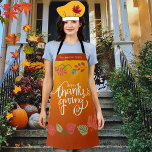 Fall Foliage Autumn Cute Family Happy Thanksgiving Apron<br><div class="desc">Cute autumn maple leaves with white typography on a gradient background in green,  yellow and burnt orange. Happy Thanksgiving and family name.</div>