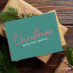 Family Christmas | Stylish Trendy Forest Green Holiday Card<br><div class="desc">Simple,  stylish "Christmas with the <your name="">" quote folded holiday cards in modern minimalist typography in festive red and white on a green background. The design can be easily personalized with your family name(s),  year or own special greeting for super cute bespoke holiday vibes!</your></div>