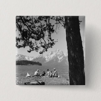 Family having picnic by lake mountains 15 cm square badge