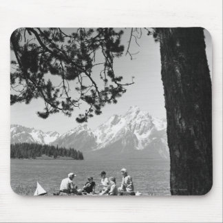 Family having picnic by lake mountains mouse mat